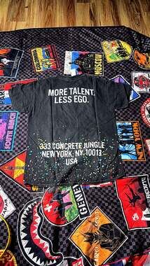 More Talent Less Ego Paint Splatter Graphic T-Shirt